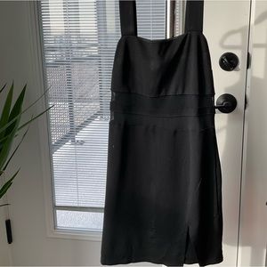 Step out in confidence with this stunning black dress.